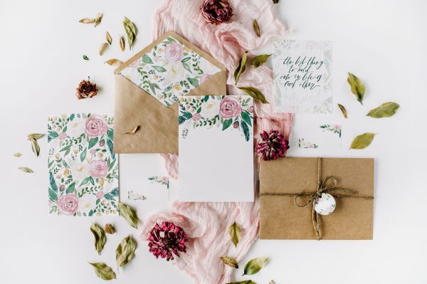 Image of blush, white and green invitations